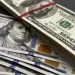 Tendencia bajista: El dólar oficial retrocede y perfora la barrera de los $1.400 por primera vez en la semana