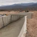 Heroico rescate en San Juan: un policía salvó a un hombre de 67 años que era arrastrado por la corriente de un canal